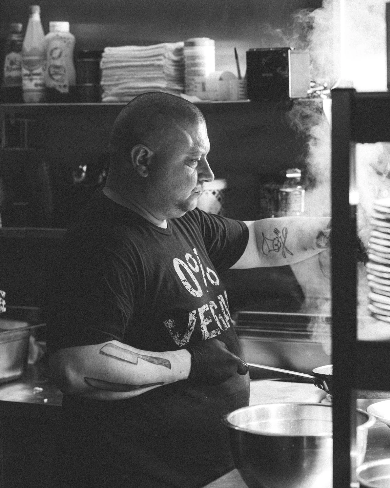 Smoke master Tiberius Tudor working in the kitchen